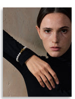 Pulseira elegante de pérolas